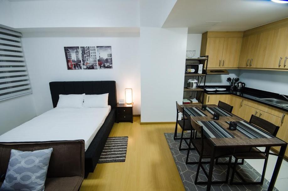 Prime Avant Bgc Location Apartments By Ph Staycation มะนิลา ภายนอก รูปภาพ
